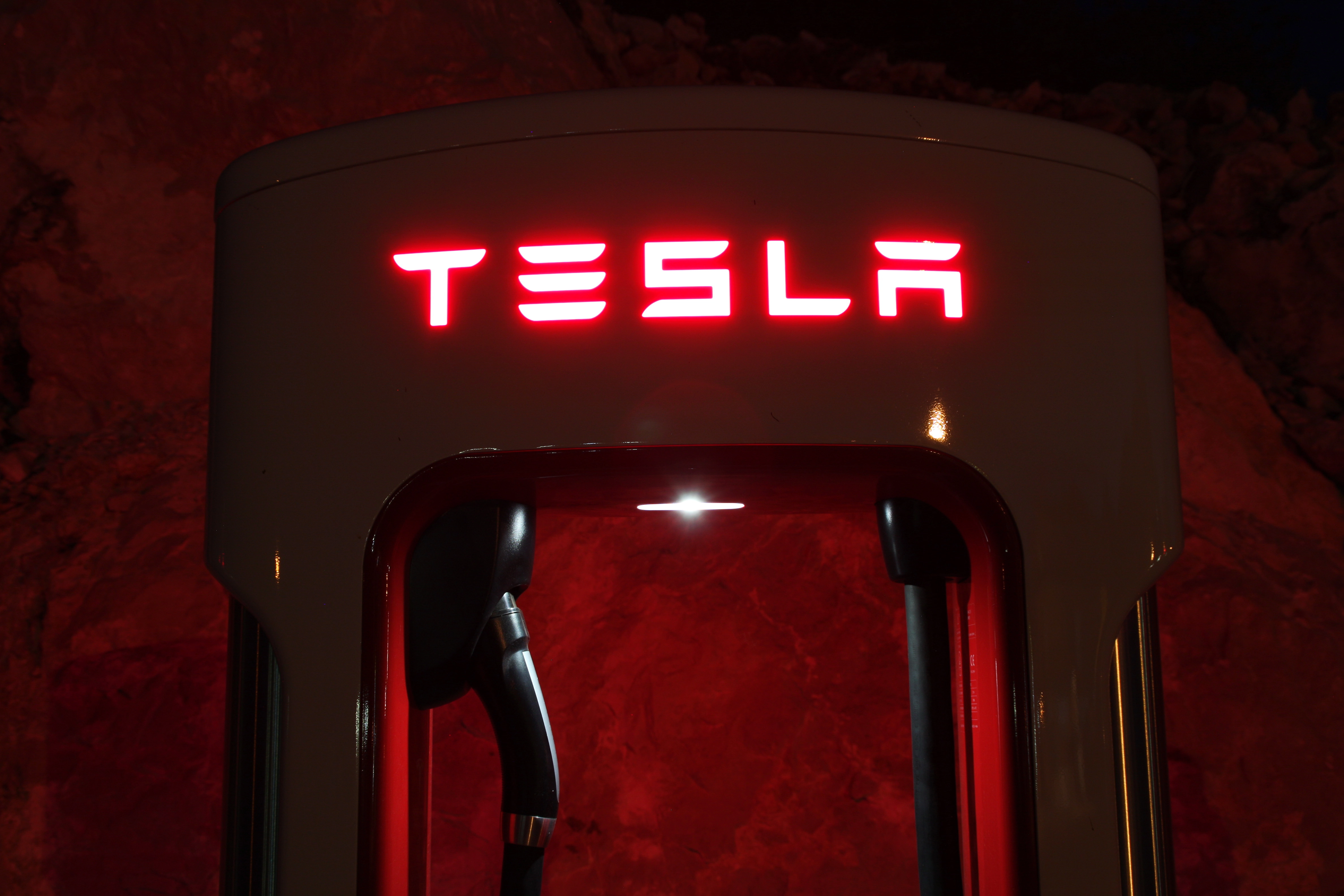 VistaCreate-443558142-stock-photo-tesla-supercharger-electric-cars-night.webp